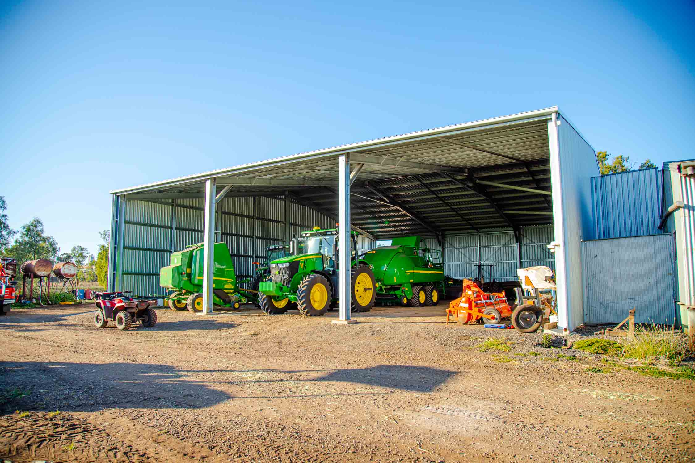 An Open Front Farm Shed with 6 metre wide bays for tractor and hay baler storage.