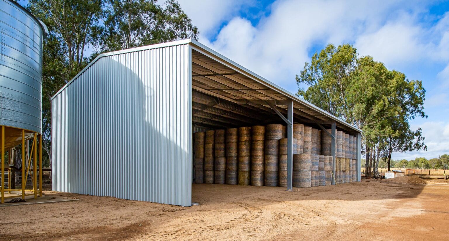 Large Open Front Farm Shed with 9 metre bays, designed for large round hay bales.