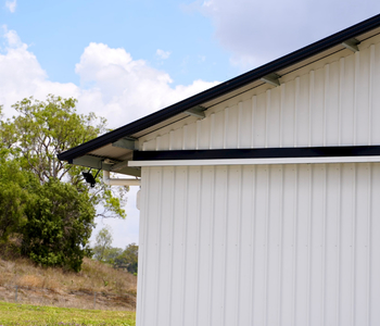 Close up of Dover White™ shed with gable overhang