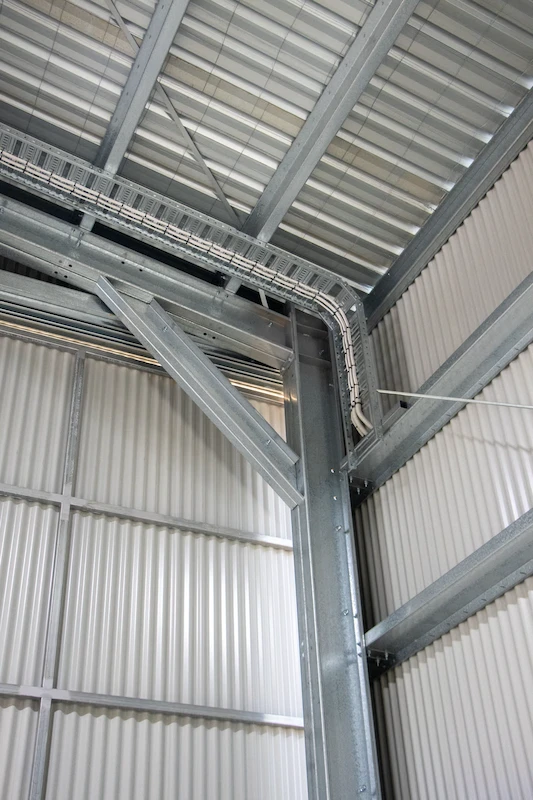 Close-up of the steel portal frame connection
