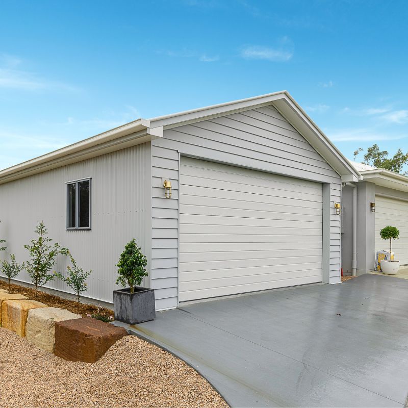 Custom steel garage in Karalee, Brisbane, with Shale Grey cladding.