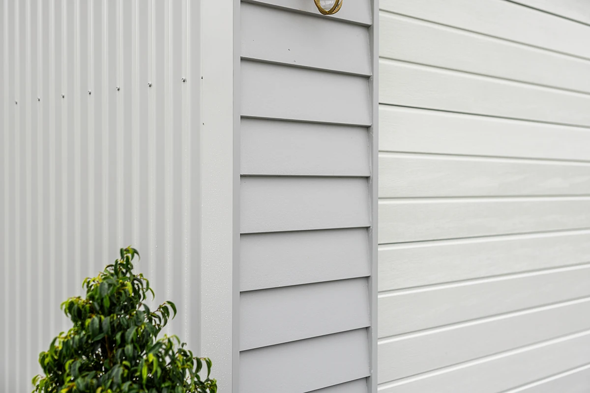 Close up of Linea board facade on custom steel garage Karalee