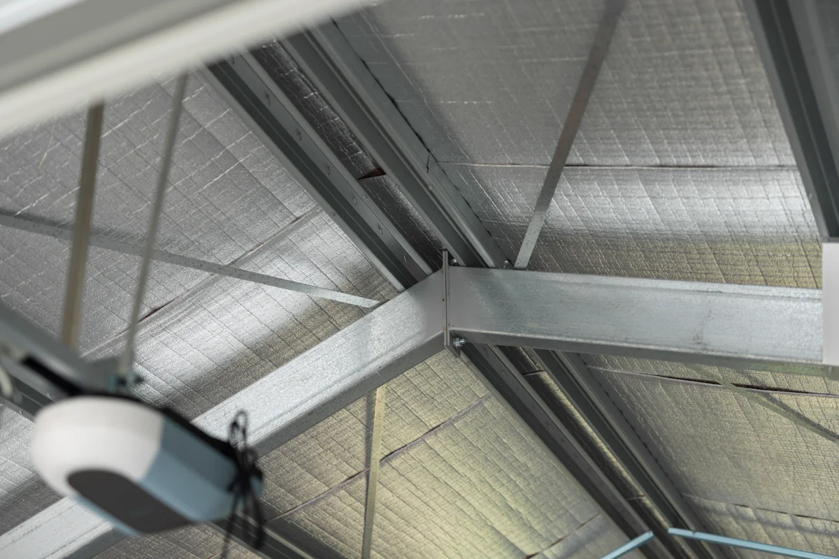 Close-up of the welded steel portal frame apex connection