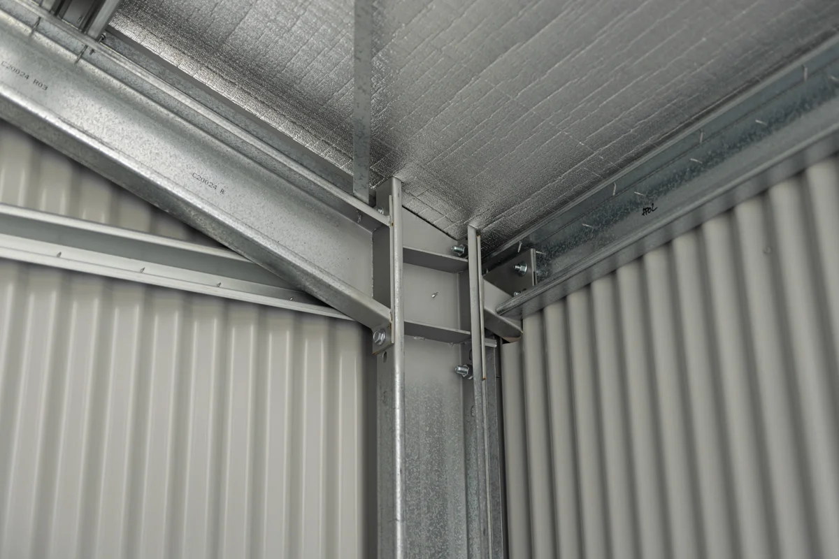 Interior view of the welded steel portal frame inside the garage